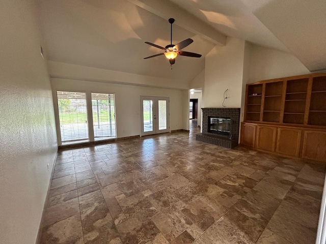 18149 Varden Dr, Madera, CA 93638 - unfurnished living room featuring high vaulted ceiling, beamed ceiling, a fireplace, stone tile flooring, and a ceiling fan