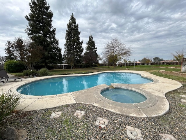 18149 Varden Dr, Madera, CA 93638 - view of pool with a patio, fence, and a pool with connected hot tub