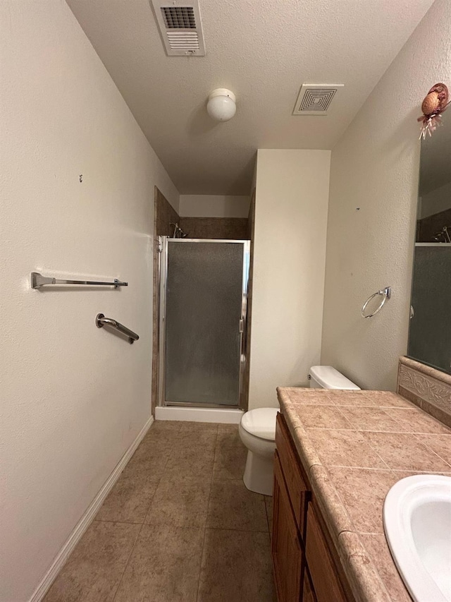 18149 Varden Dr, Madera, CA 93638 - bathroom featuring visible vents, a stall shower, toilet, and vanity