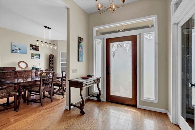355 Old Line Ave, Exeter, CA 93221 - entrance foyer featuring a chandelier, light wood-type flooring, and baseboards