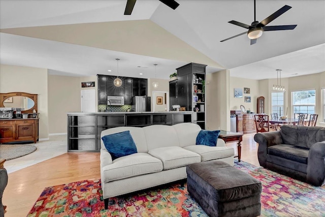 355 Old Line Ave, Exeter, CA 93221 - living area with vaulted ceiling, light wood-style floors, and ceiling fan