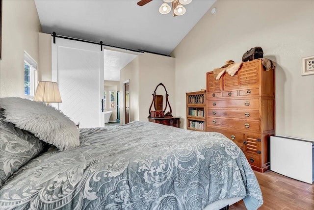 355 Old Line Ave, Exeter, CA 93221 - bedroom featuring radiator heating unit, vaulted ceiling, wood finished floors, a ceiling fan, and ensuite bath