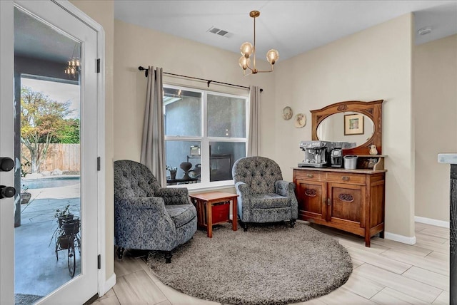 355 Old Line Ave, Exeter, CA 93221 - sitting room with visible vents, baseboards, and an inviting chandelier