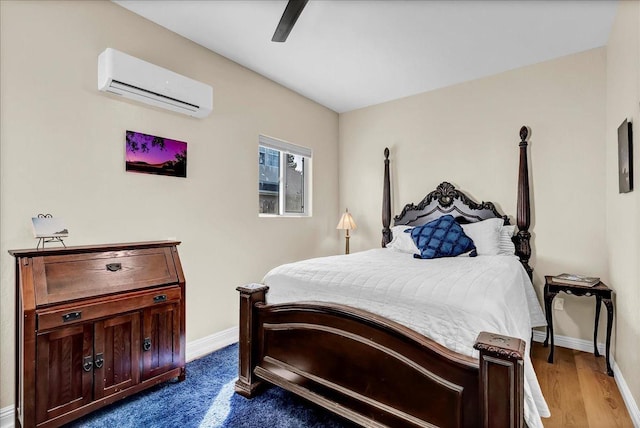 355 Old Line Ave, Exeter, CA 93221 - bedroom with an AC wall unit, baseboards, and a ceiling fan