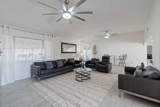 18294 Rd 27, Madera, CA 93638 - living area with light wood finished floors, baseboards, lofted ceiling, and a ceiling fan