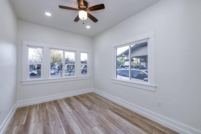 655 E Normal Ave, Fresno, CA 93704 - empty room with wood finished floors, baseboards, a ceiling fan, and recessed lighting