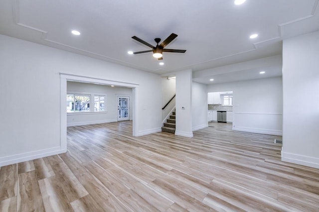 655 E Normal Ave, Fresno, CA 93704 - unfurnished living room featuring stairs, a ceiling fan, light wood-style flooring, recessed lighting, and baseboards