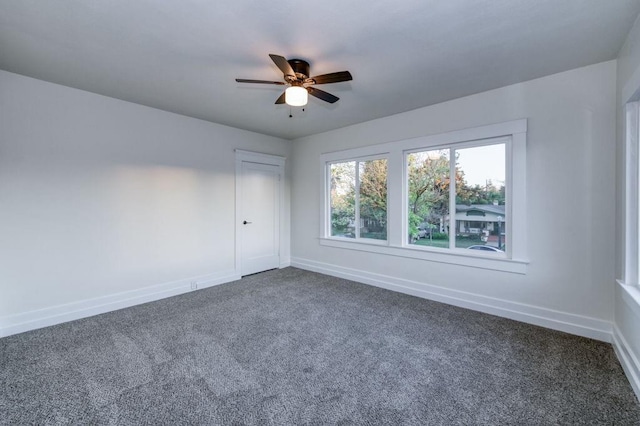 655 E Normal Ave, Fresno, CA 93704 - spare room featuring baseboards, dark carpet, and ceiling fan