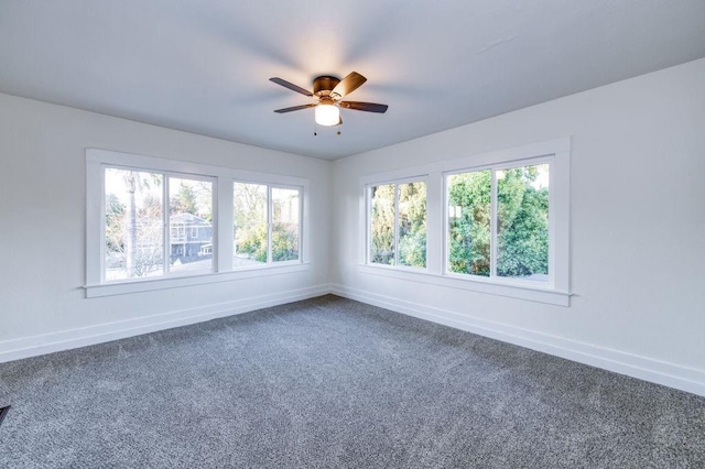 655 E Normal Ave, Fresno, CA 93704 - spare room with baseboards, ceiling fan, and dark carpet