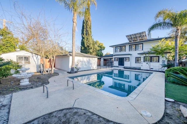 655 E Normal Ave, Fresno, CA 93704 - view of swimming pool with a patio area and an outdoor structure