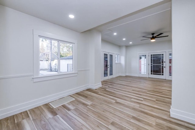 655 E Normal Ave, Fresno, CA 93704 - unfurnished living room featuring light wood-style floors, baseboards, recessed lighting, and a ceiling fan