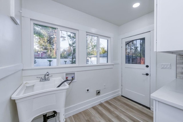 655 E Normal Ave, Fresno, CA 93704 - entryway with healthy amount of natural light, light wood-style flooring, baseboards, and a sink