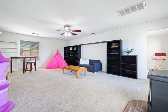 1110 Minarets Ave, Clovis, CA 93611 - living area featuring carpet and ceiling fan