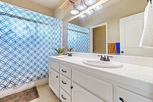 1110 Minarets Ave, Clovis, CA 93611 - bathroom featuring double vanity and tile patterned flooring