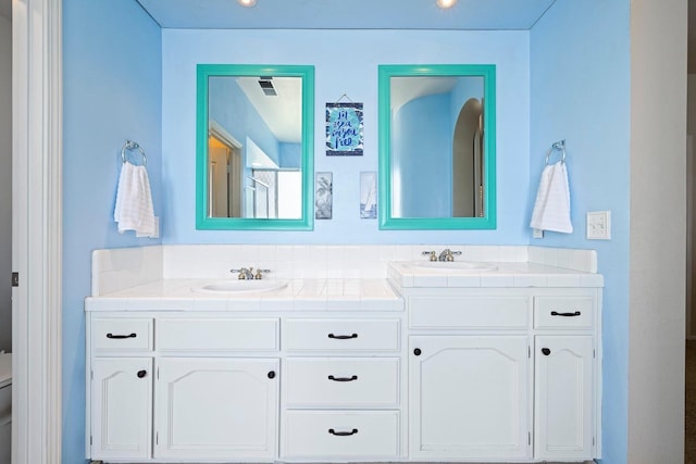 1110 Minarets Ave, Clovis, CA 93611 - bathroom featuring double vanity and toilet