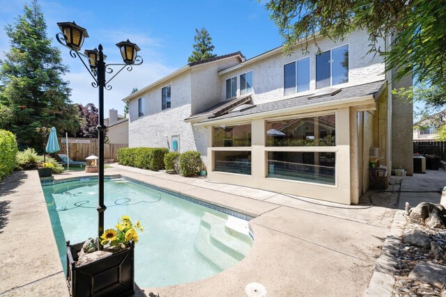 1110 Minarets Ave, Clovis, CA 93611 - view of pool with a fenced backyard and a patio