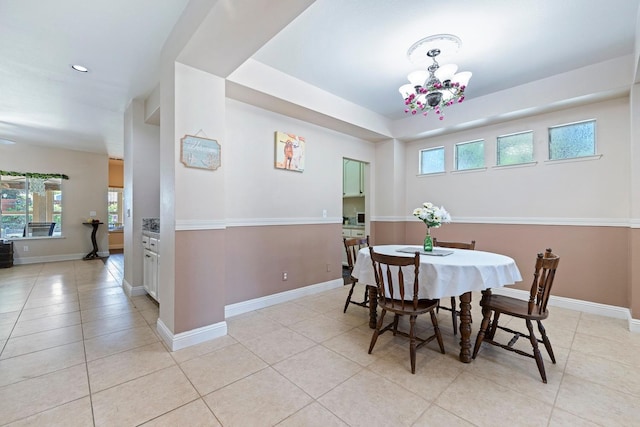 1110 Minarets Ave, Clovis, CA 93611 - dining room featuring light tile patterned flooring, baseboards, recessed lighting, and a chandelier