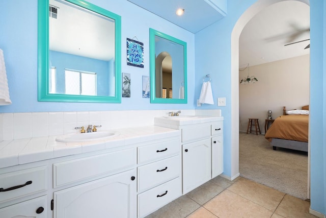 1110 Minarets Ave, Clovis, CA 93611 - full bath with double vanity, tile patterned floors, and ensuite bath