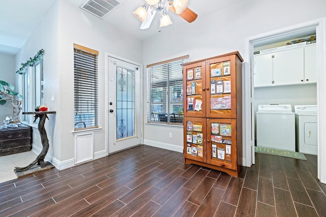 1110 Minarets Ave, Clovis, CA 93611 - entryway featuring washer and clothes dryer, a ceiling fan, dark wood-style floors, and baseboards