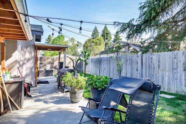 view of patio / terrace with a fenced backyard and grilling area