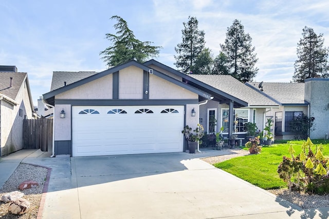 single story home featuring roof with shingles, concrete driveway, stucco siding, an attached garage, and a front lawn