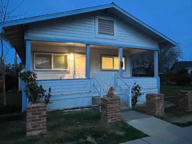 bungalow-style house featuring a porch