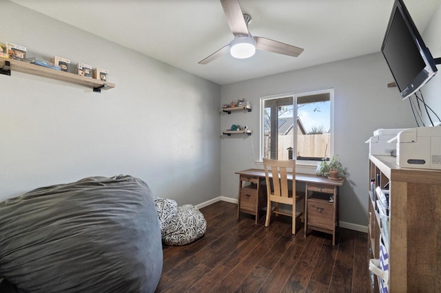 office space with wood finished floors, baseboards, and a ceiling fan