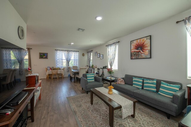4865 E Alexander Ave, Fresno, CA 93725 - living area featuring wood finished floors and recessed lighting