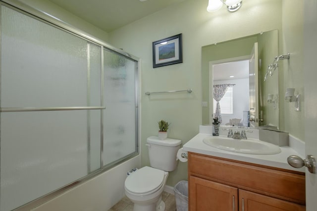 4865 E Alexander Ave, Fresno, CA 93725 - full bath with vanity, bath / shower combo with glass door, and tile patterned floors