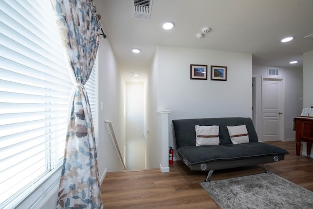 4865 E Alexander Ave, Fresno, CA 93725 - living area with an upstairs landing, wood finished floors, and recessed lighting
