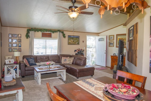 carpeted living area featuring ceiling fan