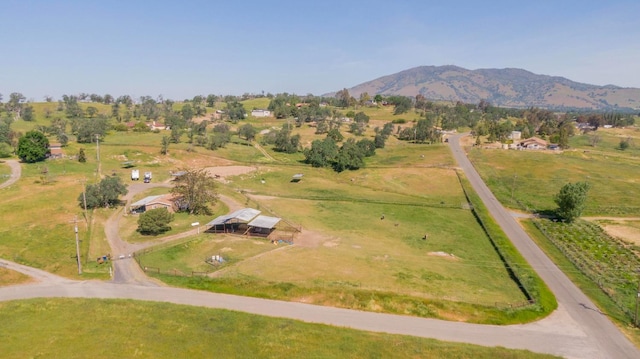 bird's eye view featuring a rural view and a mountain view