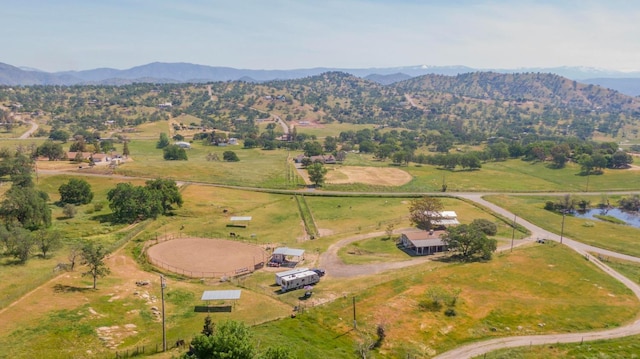 drone / aerial view featuring a mountain view and a rural view