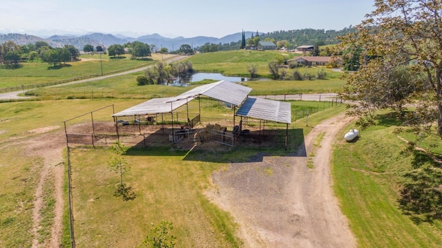 bird's eye view featuring a rural view and a water and mountain view