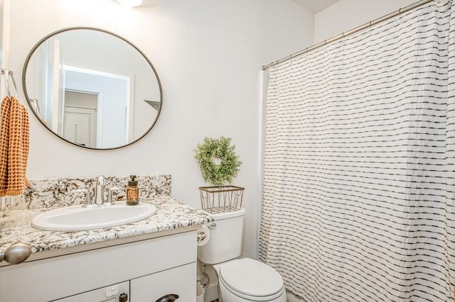 408 Grant Ave W, Madera, CA 93636 - bathroom featuring vanity, toilet, and a shower with shower curtain