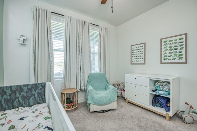408 Grant Ave W, Madera, CA 93636 - carpeted bedroom with a ceiling fan