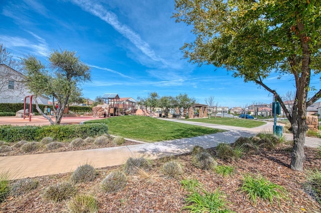 408 Grant Ave W, Madera, CA 93636 - view of home's community featuring a lawn and playground community