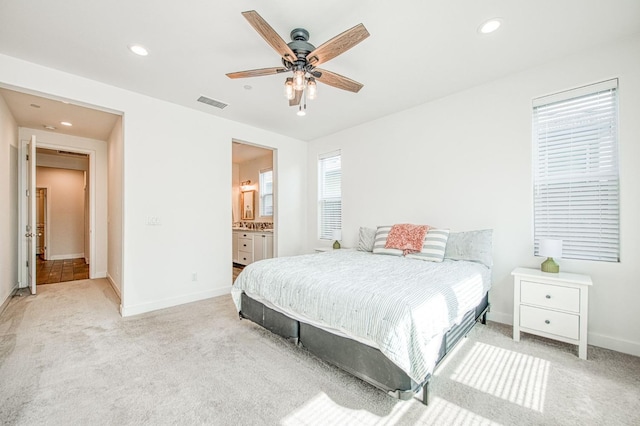 408 Grant Ave W, Madera, CA 93636 - bedroom with ceiling fan, light colored carpet, visible vents, baseboards, and recessed lighting