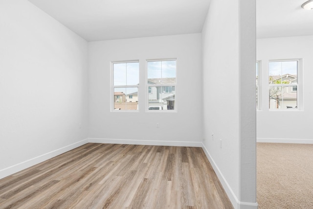 276 Huckleberry Ln S, Madera, CA 93636 - unfurnished room featuring light wood-style floors and baseboards