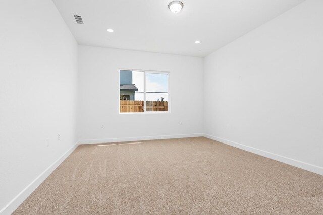 276 Huckleberry Ln S, Madera, CA 93636 - unfurnished room featuring baseboards, light colored carpet, recessed lighting, and visible vents