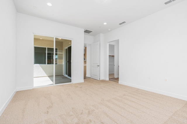 276 Huckleberry Ln S, Madera, CA 93636 - unfurnished bedroom with carpet floors, visible vents, baseboards, recessed lighting, and a spacious closet