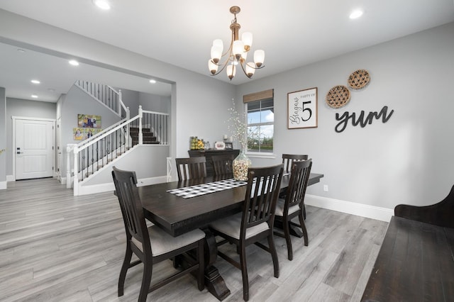 3887 N Condor Ct, Sanger, CA 93657 - dining room featuring stairs, a chandelier, recessed lighting, and light wood-style floors