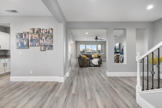 3887 N Condor Ct, Sanger, CA 93657 - entryway with light wood-style flooring, stairs, recessed lighting, and a ceiling fan
