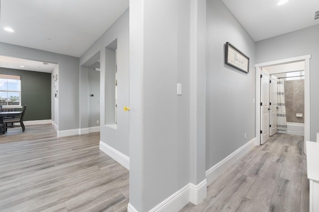3887 N Condor Ct, Sanger, CA 93657 - hall with light wood-style floors and recessed lighting