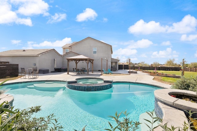 3887 N Condor Ct, Sanger, CA 93657 - view of swimming pool with a gazebo, a pool with connected hot tub, a patio area, and a fenced backyard