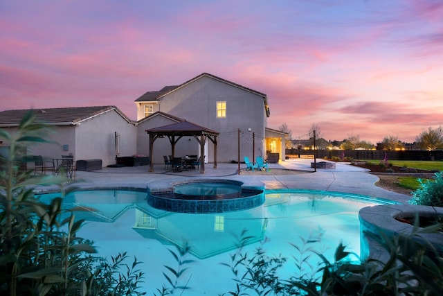 3887 N Condor Ct, Sanger, CA 93657 - view of swimming pool featuring a gazebo, a patio, a pool with connected hot tub, and a fenced backyard