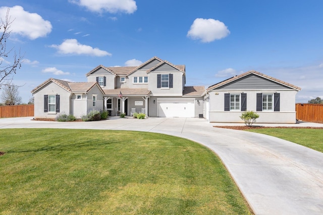 3887 N Condor Ct, Sanger, CA 93657 - traditional-style house featuring concrete driveway, an attached garage, a tile roof, and stucco siding