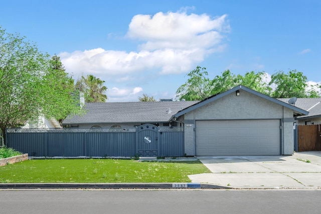 ranch-style home with concrete driveway, stucco siding, an attached garage, a fenced front yard, and a gate