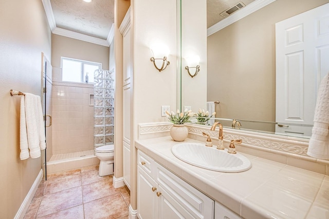 1643 E Shadow Glen Dr, Fresno, CA 93730 - full bathroom featuring visible vents, a stall shower, baseboards, toilet, and ornamental molding