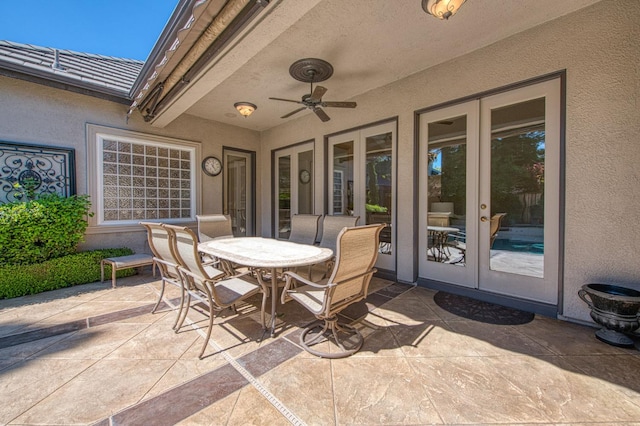 1643 E Shadow Glen Dr, Fresno, CA 93730 - view of patio / terrace with french doors, a ceiling fan, and outdoor dining area